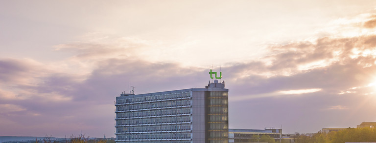 Cafeteria and math tower at sunset